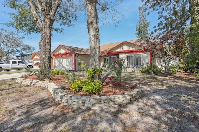 view of front of property featuring an attached garage