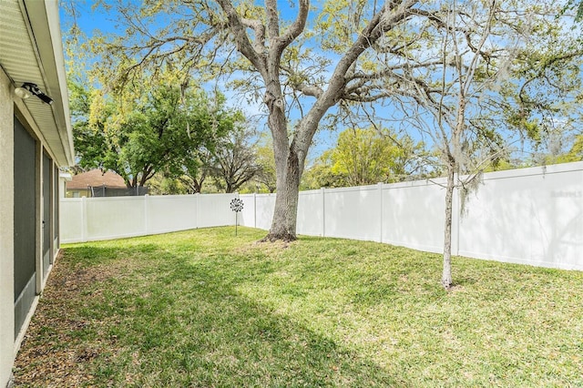 view of yard featuring a fenced backyard