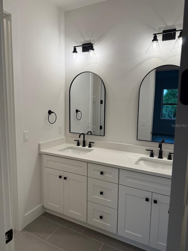 418 W Frances Ave Unit 2, Tampa, FL 33602 - bathroom featuring tile patterned flooring and double vanity