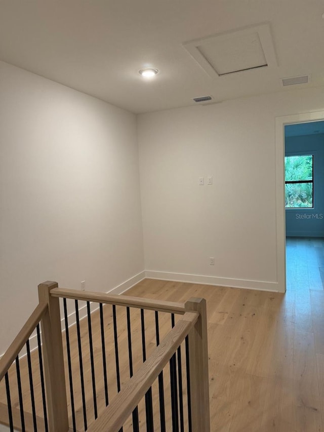 418 W Frances Ave Unit 2, Tampa, FL 33602 - hall with light wood-style flooring, baseboards, an upstairs landing, and recessed lighting