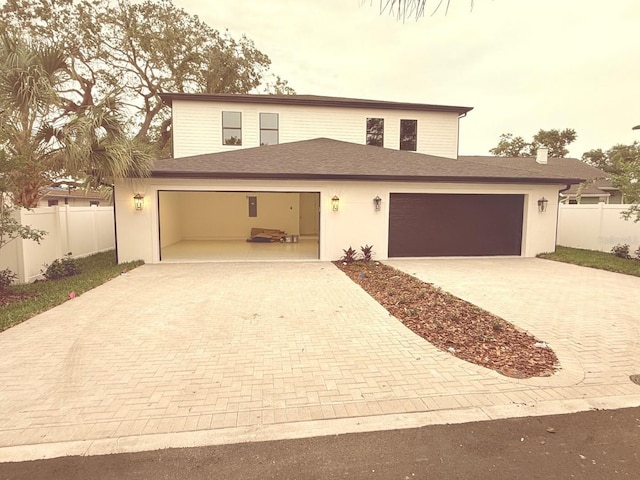 418 W Frances Ave Unit 2, Tampa, FL 33602 - traditional-style house with decorative driveway, a garage, and stucco siding
