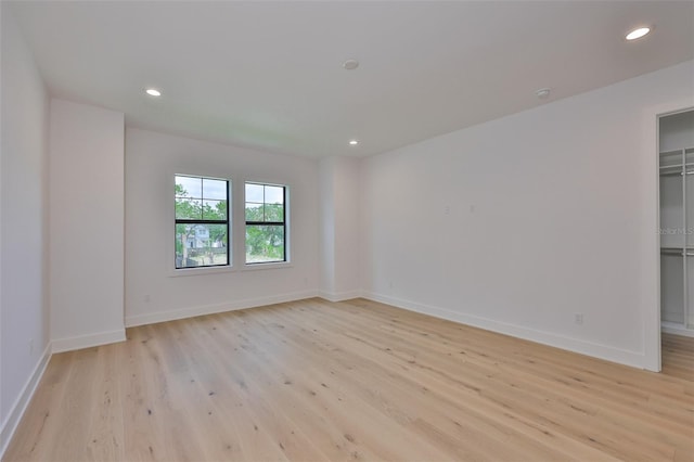 418 W Frances Ave Unit 2, Tampa, FL 33602 - unfurnished room featuring light wood-style flooring, baseboards, and recessed lighting