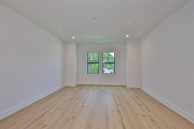 418 W Frances Ave Unit 2, Tampa, FL 33602 - unfurnished room with light wood-style floors, baseboards, and recessed lighting