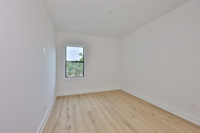 418 W Frances Ave Unit 2, Tampa, FL 33602 - spare room featuring light wood-style floors, baseboards, and a smoke detector