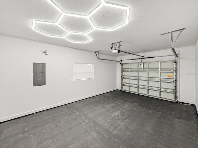 garage with electric panel, baseboards, and a garage door opener