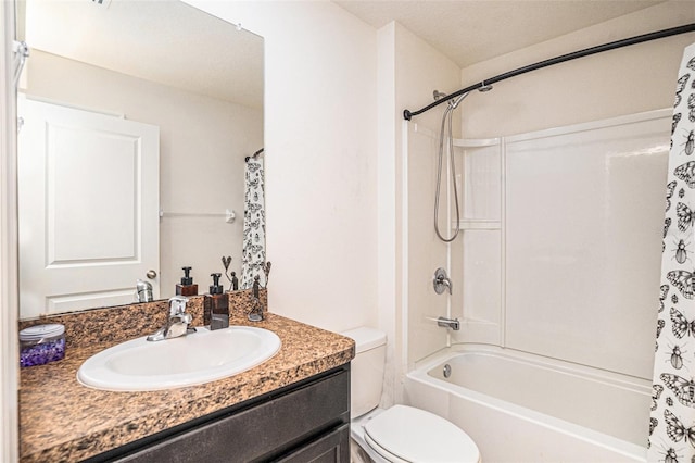 bathroom with shower / tub combo, vanity, and toilet