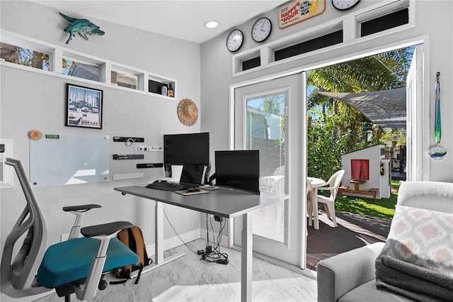 office featuring marble finish floor, recessed lighting, and baseboards