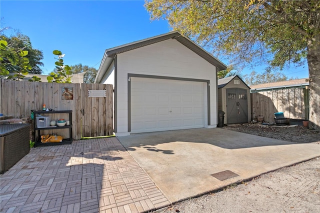 garage with fence