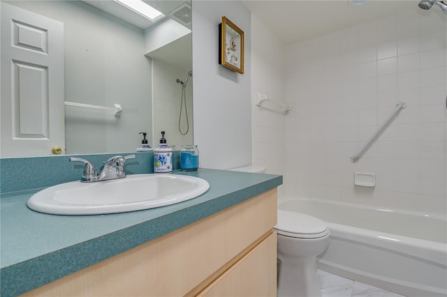 bathroom featuring marble finish floor, shower / bathtub combination, visible vents, toilet, and vanity