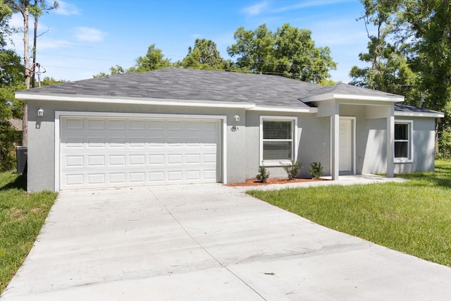 ranch-style house with stucco siding, a shingled roof, concrete driveway, a front yard, and a garage