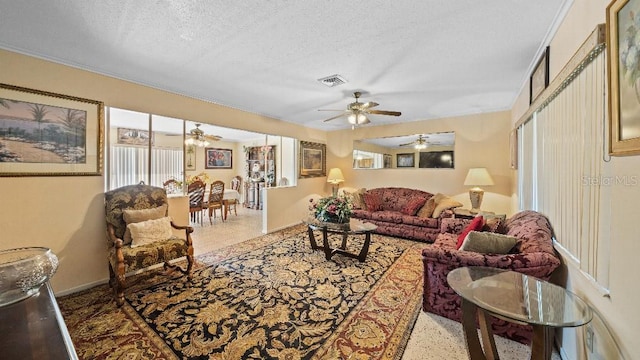 2453 Teri St, Auburndale, FL 33823 - living area featuring visible vents, a textured ceiling, and baseboards