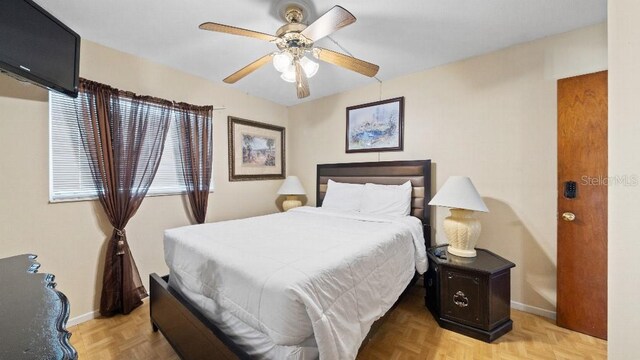 2453 Teri St, Auburndale, FL 33823 - bedroom featuring ceiling fan and baseboards