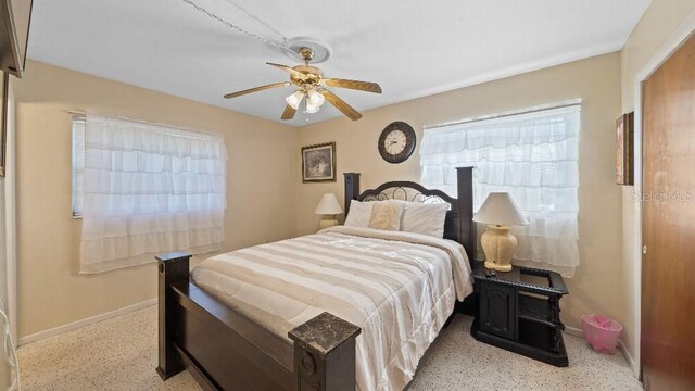 2453 Teri St, Auburndale, FL 33823 - bedroom featuring ceiling fan, baseboards, and light speckled floor