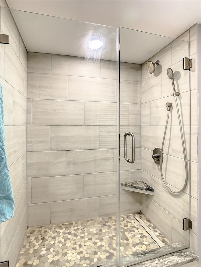 full bath featuring a stall shower