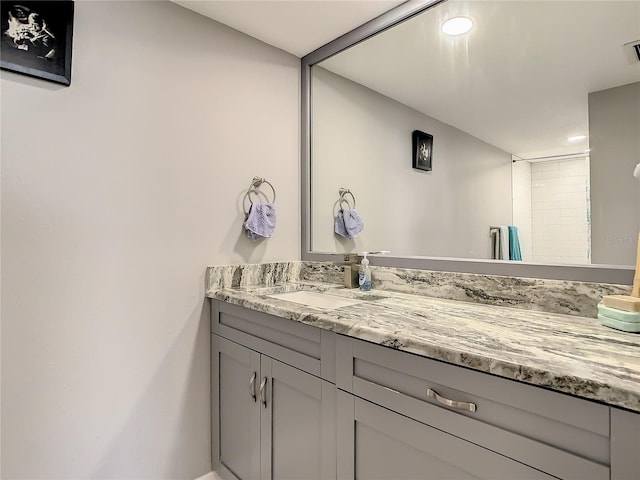 full bathroom with visible vents and vanity