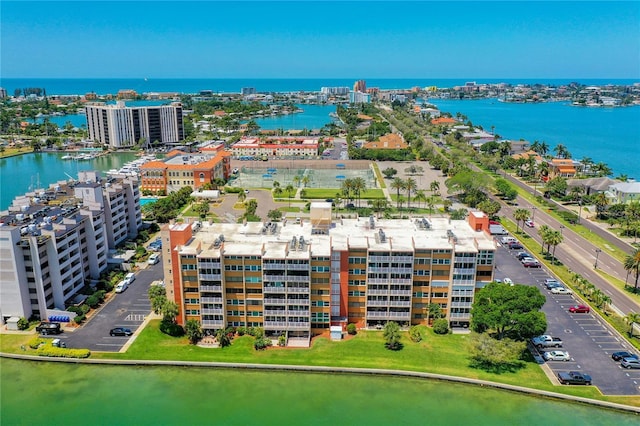 bird's eye view featuring a view of city and a water view