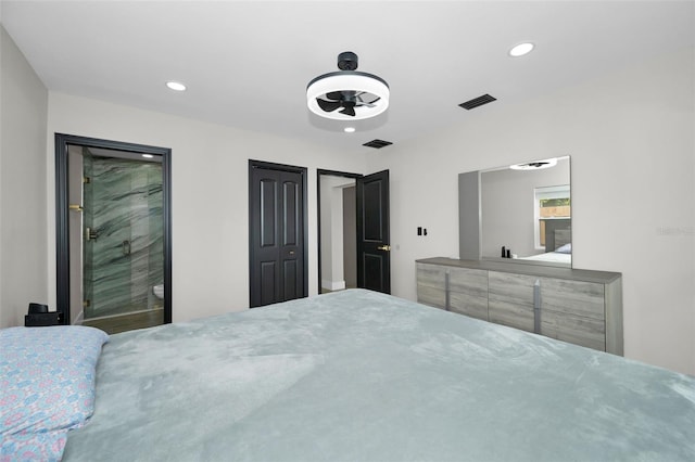 bedroom with visible vents and recessed lighting