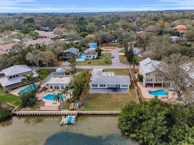 birds eye view of property with a residential view