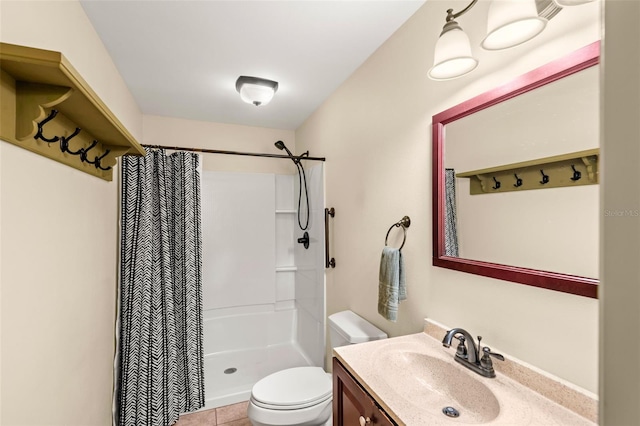 full bathroom featuring tile patterned flooring, a shower stall, toilet, and vanity