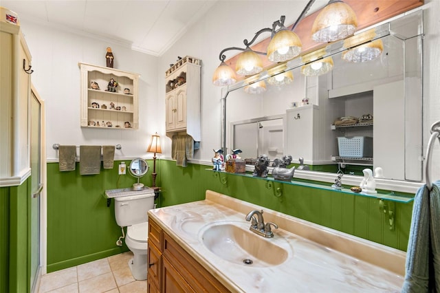 full bathroom with tile patterned flooring, toilet, crown molding, and vanity