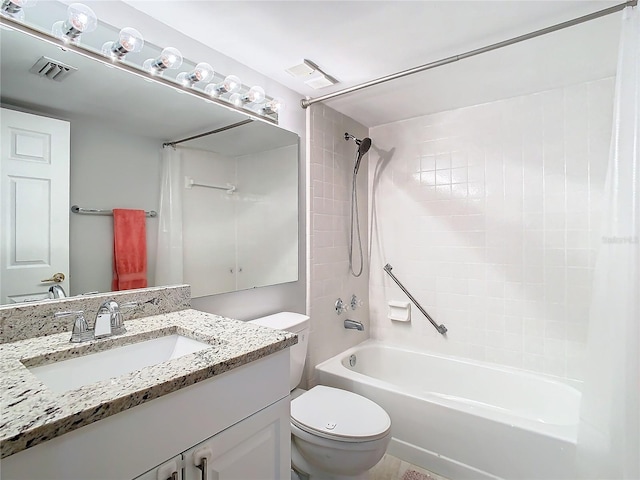 bathroom with toilet, visible vents, shower / bath combo with shower curtain, and vanity