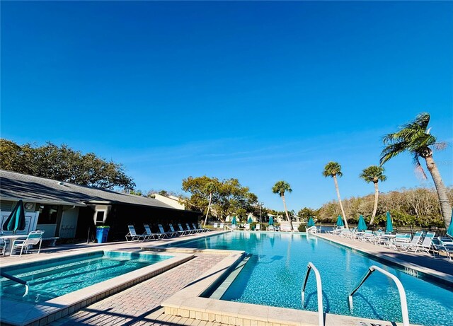 pool with a patio