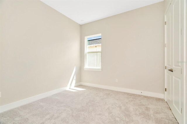 10714 Torchwood Sea Way, San Antonio, FL 33576 - unfurnished room with light carpet and baseboards