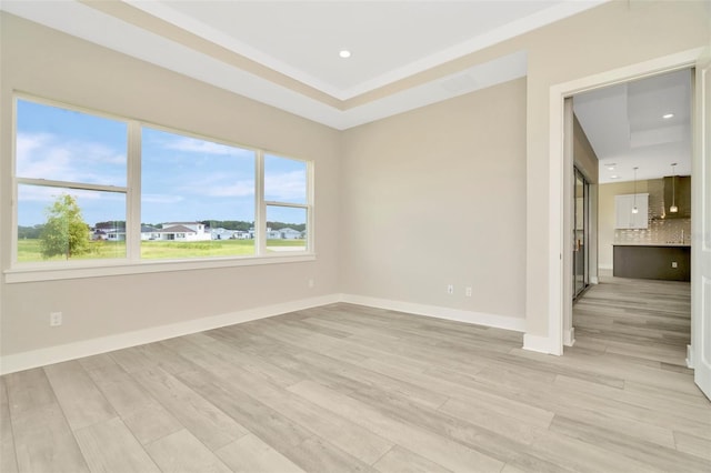 10714 Torchwood Sea Way, San Antonio, FL 33576 - unfurnished room with light wood-style floors, recessed lighting, and baseboards