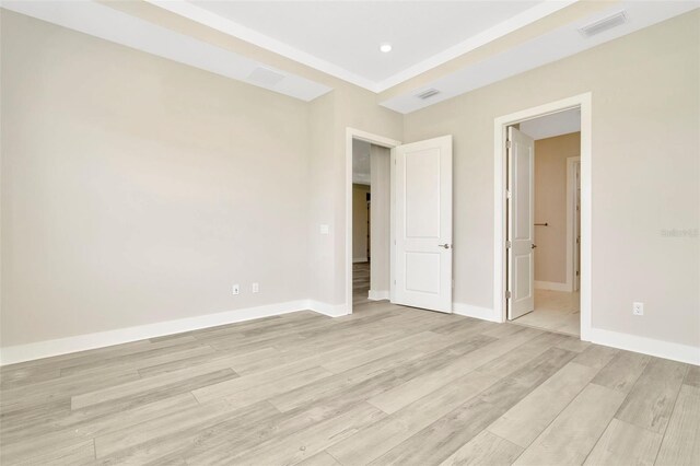 10714 Torchwood Sea Way, San Antonio, FL 33576 - unfurnished room featuring recessed lighting, light wood-type flooring, visible vents, and baseboards