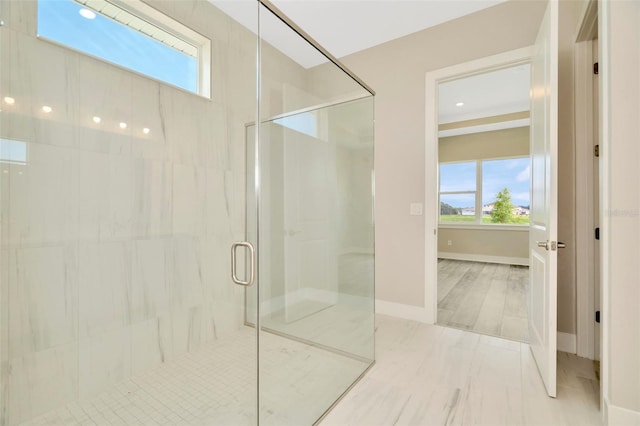 10714 Torchwood Sea Way, San Antonio, FL 33576 - bathroom featuring a shower stall and baseboards