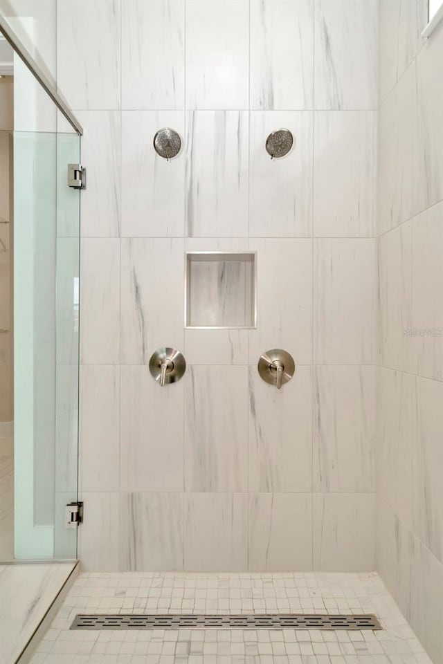 10714 Torchwood Sea Way, San Antonio, FL 33576 - full bathroom featuring a shower stall