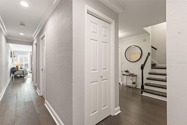 hallway featuring recessed lighting, dark wood-style flooring, baseboards, stairs, and crown molding