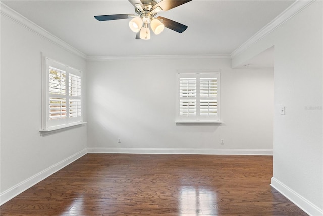 spare room with a ceiling fan, crown molding, baseboards, and dark wood-style flooring