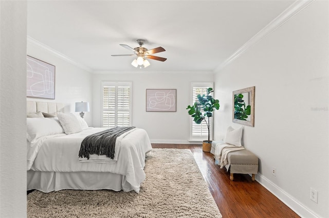 bedroom featuring ceiling fan, ornamental molding, dark wood-type flooring, and baseboards