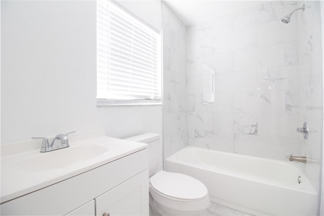 bathroom with  shower combination, toilet, and vanity