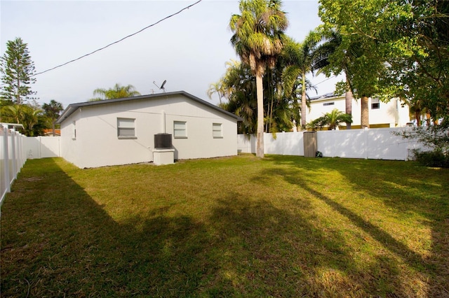 view of yard featuring cooling unit and a fenced backyard