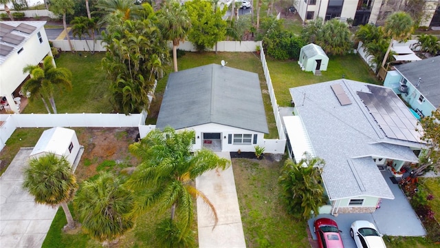 birds eye view of property with a residential view