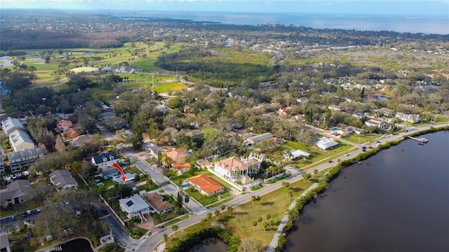 birds eye view of property featuring a residential view and a water view