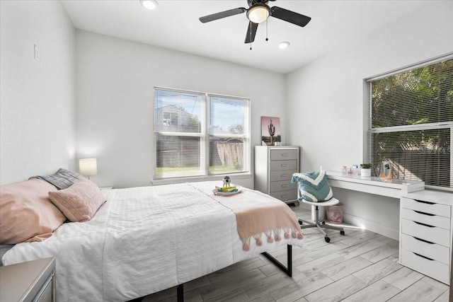 4440 58th Ave N, Saint Petersburg, FL 33714 - bedroom with a ceiling fan, recessed lighting, light wood-style flooring, and baseboards