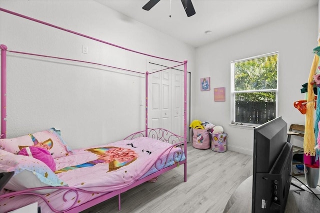 4440 58th Ave N, Saint Petersburg, FL 33714 - bedroom featuring a closet, light wood-style flooring, and a ceiling fan