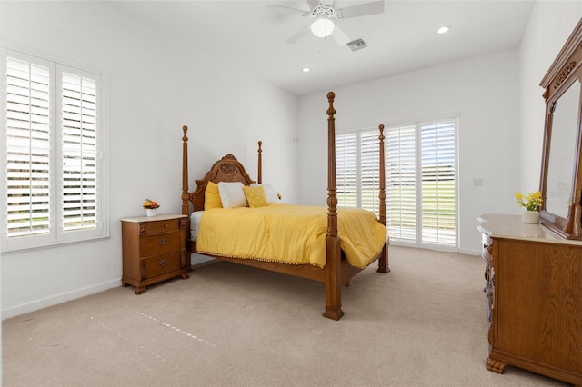 bedroom with light carpet, baseboards, visible vents, access to exterior, and recessed lighting