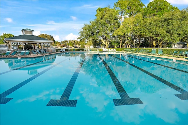 community pool featuring a gazebo