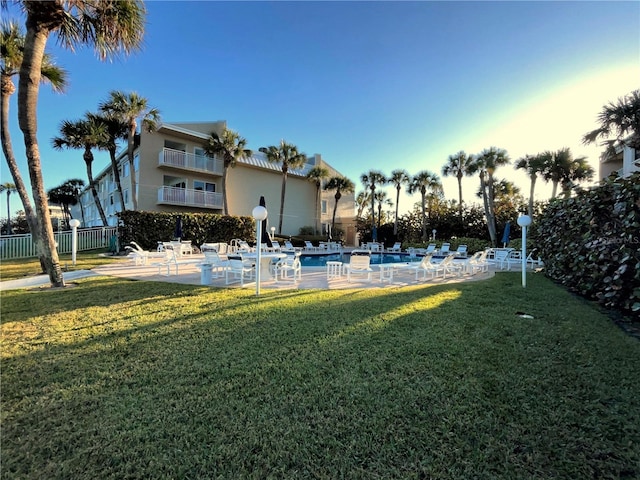 view of yard featuring a patio and fence