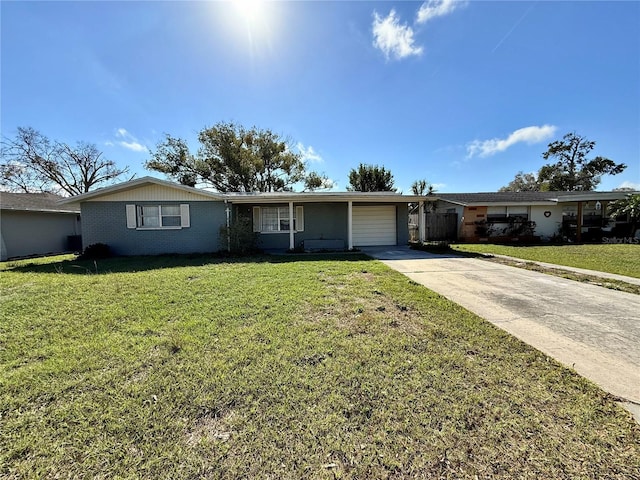 ranch-style house with a garage, a front lawn, concrete driveway, and brick siding