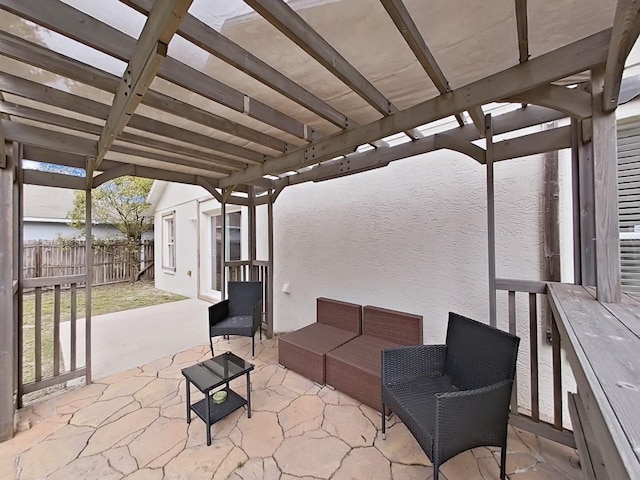 view of patio with fence and an outdoor living space