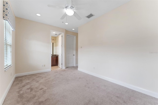 unfurnished room featuring light carpet, baseboards, visible vents, ceiling fan, and recessed lighting