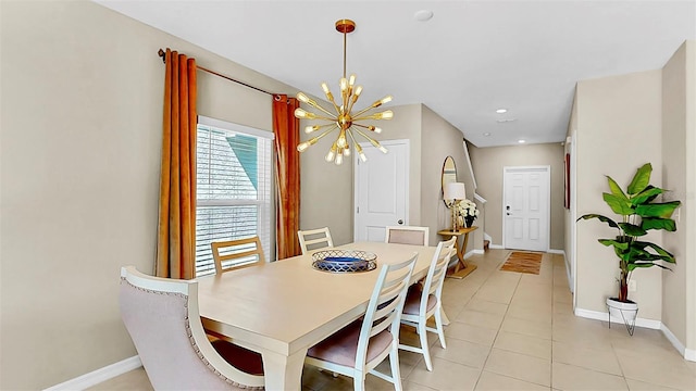 dining room featuring light tile patterned floors, baseboards, a notable chandelier, and recessed lighting