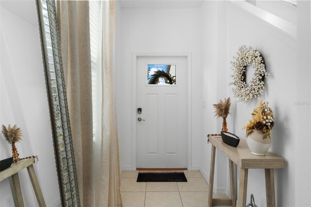 5994 Shiner St, Land O Lakes, FL 34638 - entryway featuring light tile patterned floors
