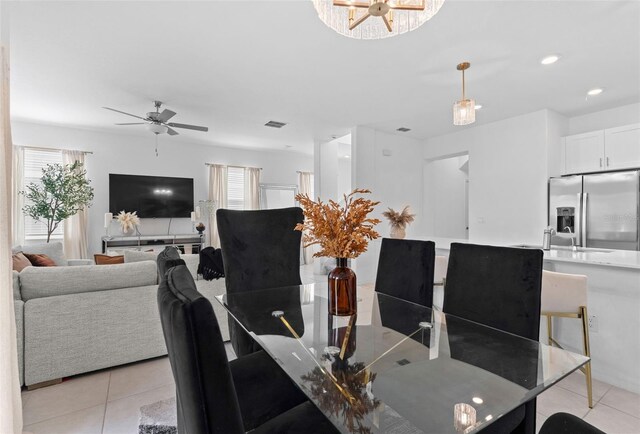 5994 Shiner St, Land O Lakes, FL 34638 - dining room with a healthy amount of sunlight, visible vents, and light tile patterned flooring