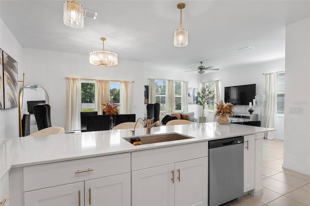 5994 Shiner St, Land O Lakes, FL 34638 - kitchen featuring dishwasher, light countertops, open floor plan, and pendant lighting